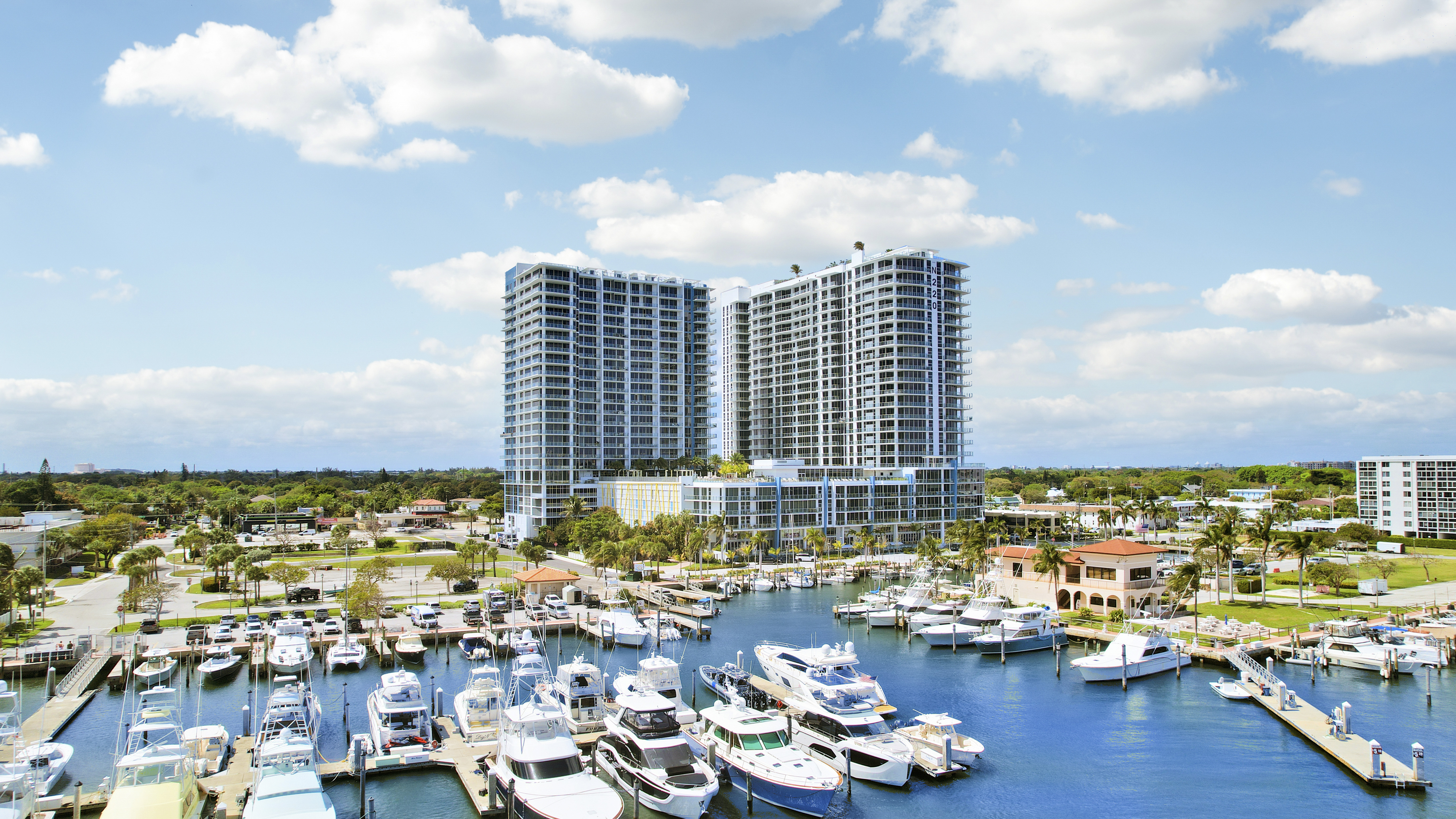 Nautilus 220 waterfront towers rising above the marina